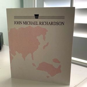 Brand new- John Michael Richardson two-tone earrings.